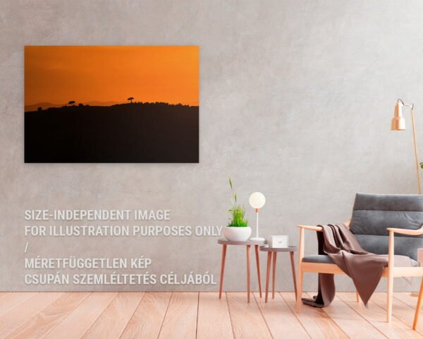 A fine art photography print of a backlight nature photograph of a hill and some trees