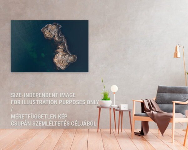 A fine art photography print of an island in a blue-green silky water hanging at a home