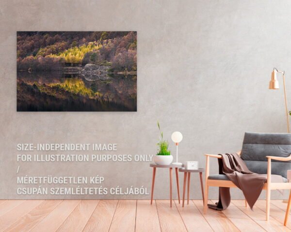 A wall art of a colorful autumn forest and its reflection on a water hanging at a home