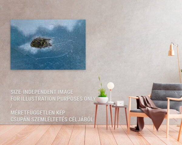 A wall art in a home showing an island in the middle of a frozen lake