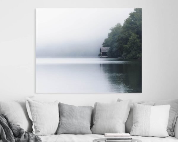 Minimalist wall art hanging at a home showing a lakehouse