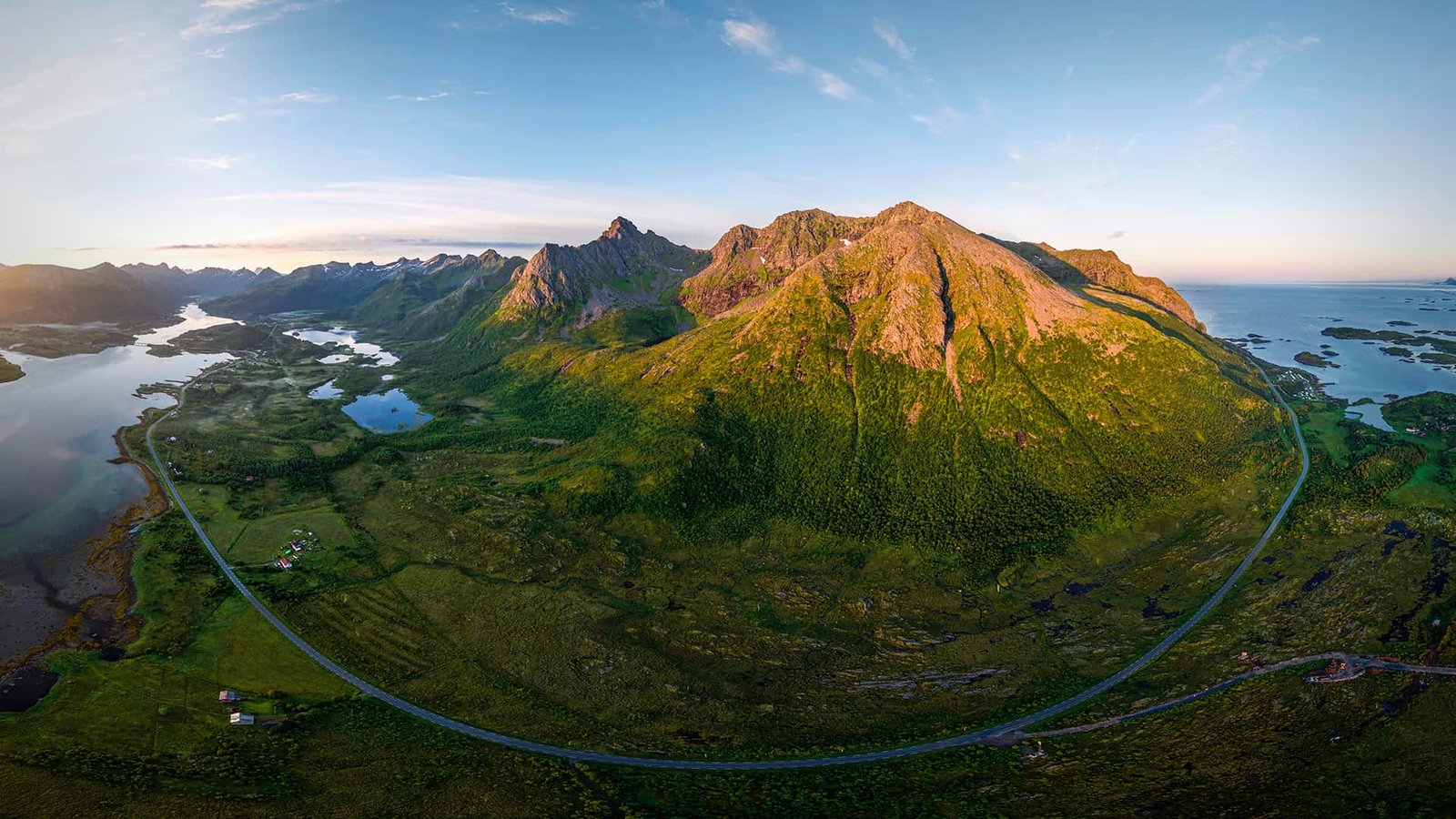 Aerial view of a sunny mountain in Lofoten
